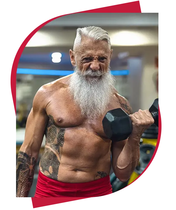 Active adult over 50 strength training in a gym